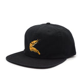 Black cap with a gold banana slug embroidered design on a white background