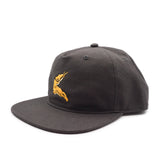 Black cap with a yellow banana slug logo on a white background