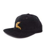 Side view of a black corduroy cap with a yellow banana slug embroidered logo on a white background