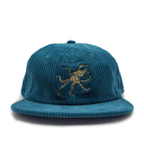 Blue corduroy cap with a blue ringed octopus on a white background