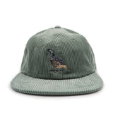 Green corduroy cap with a California Quail embroidered on a white background