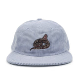 Light blue corduroy cap with a gaboon viper design on a white background