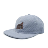 Light blue corduroy cap with a gaboon viper snake design on a white background