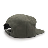 Earth green cap on a white background