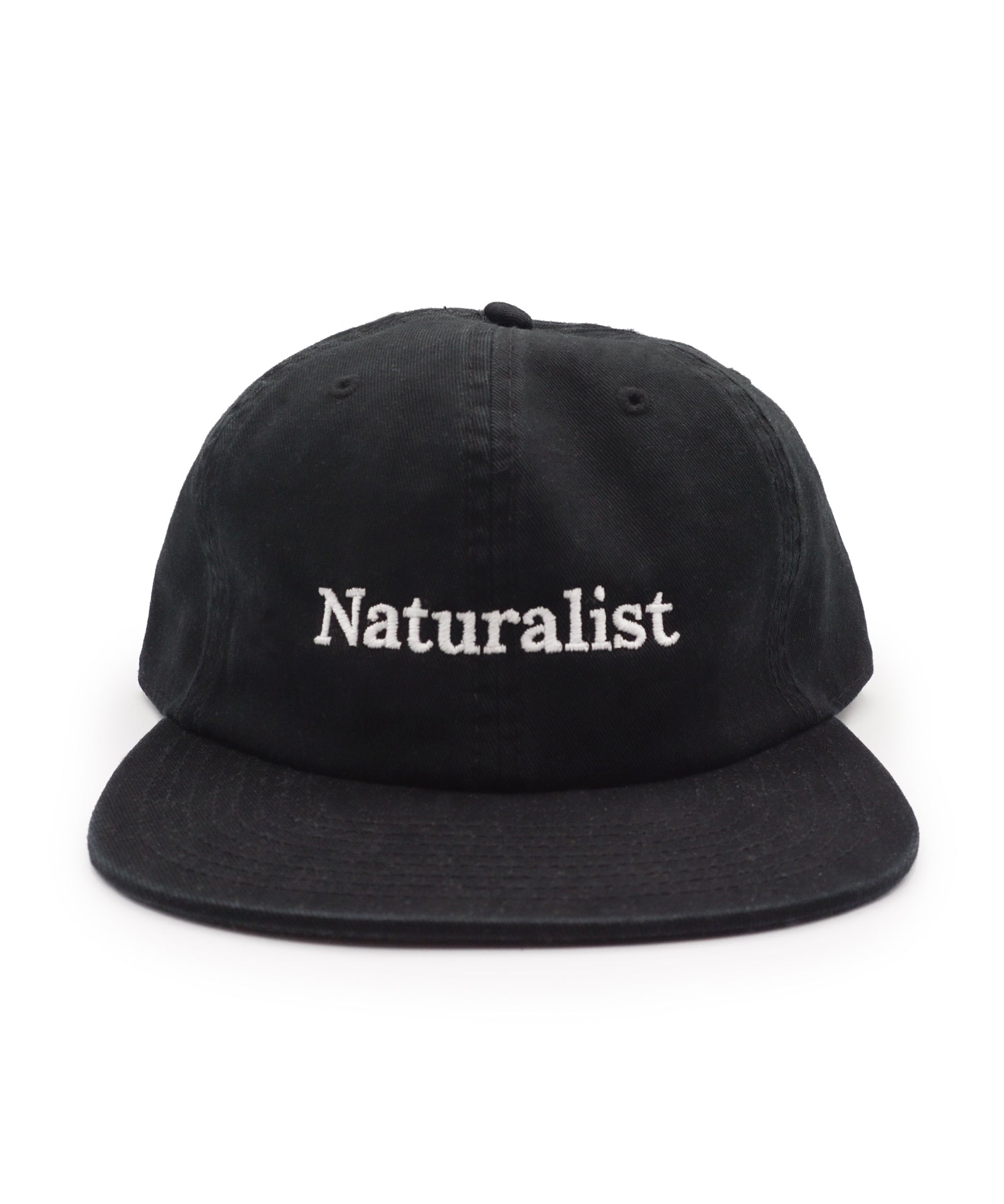Black cap with 'Naturalist' text on a white background