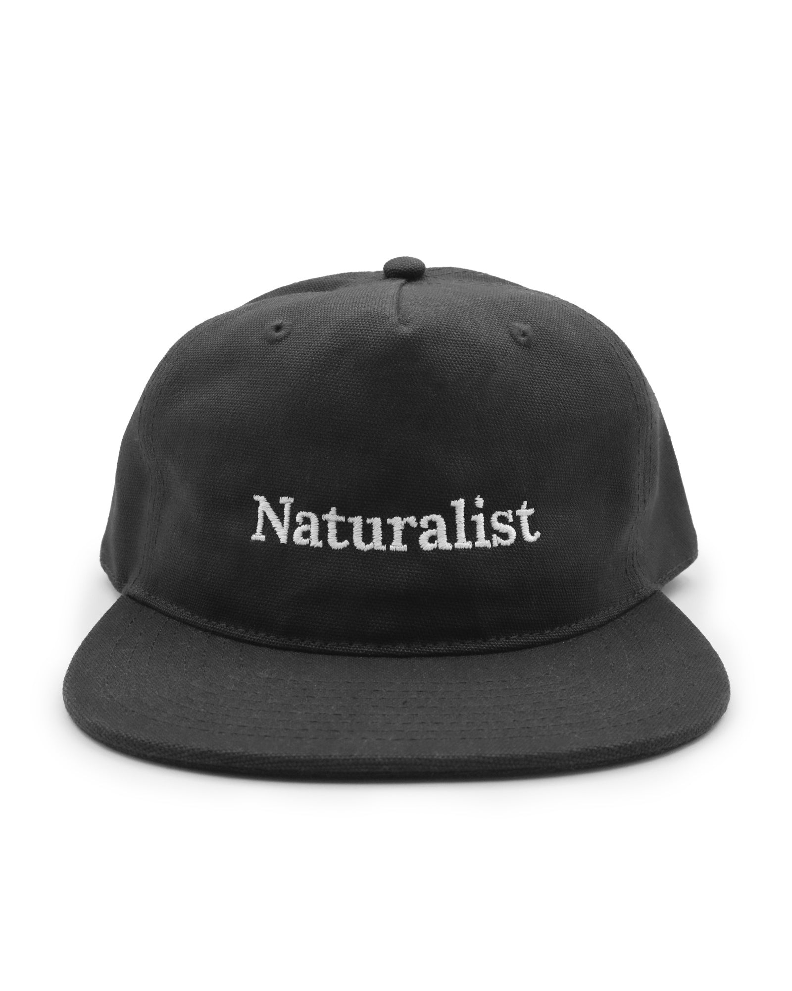 Black cap with 'Naturalist' text on a white background