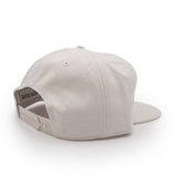 Bone colored cap on a white background