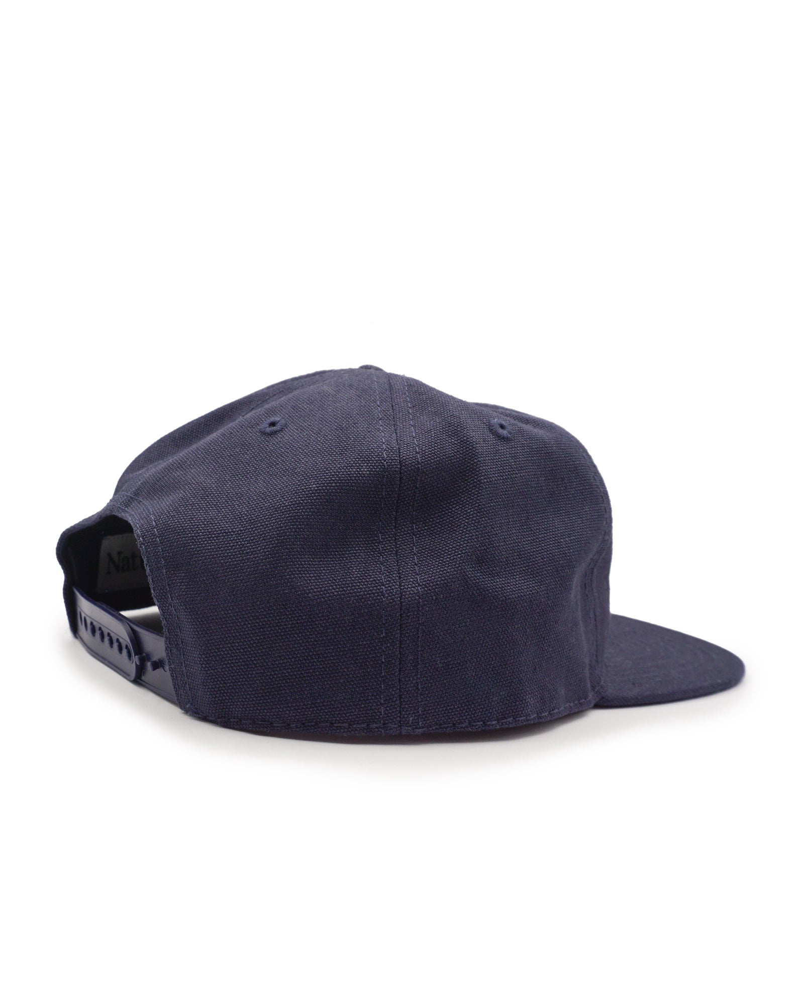 Navy blue cap on a white background