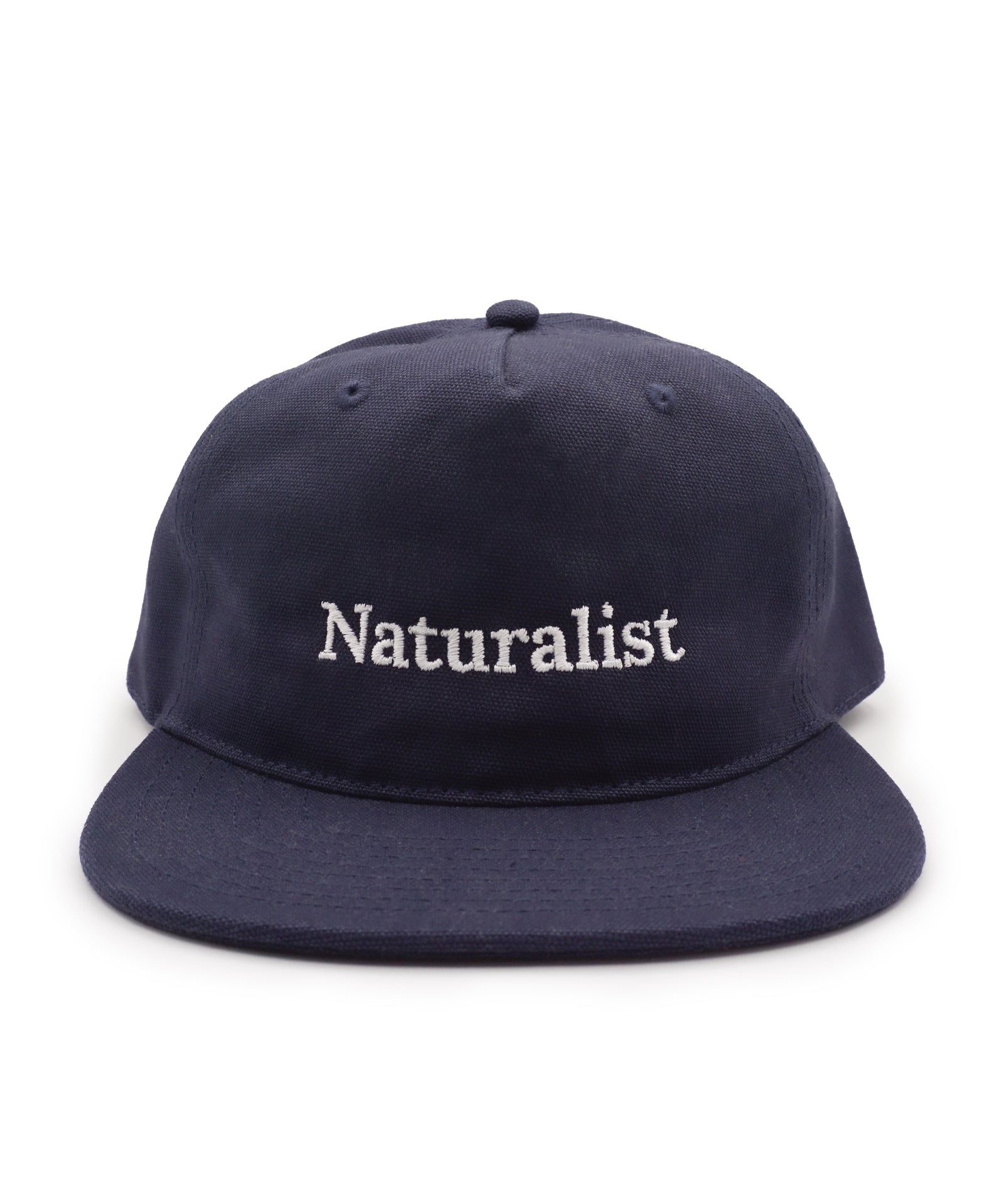 Navy blue cap with 'Naturalist' text on a white background