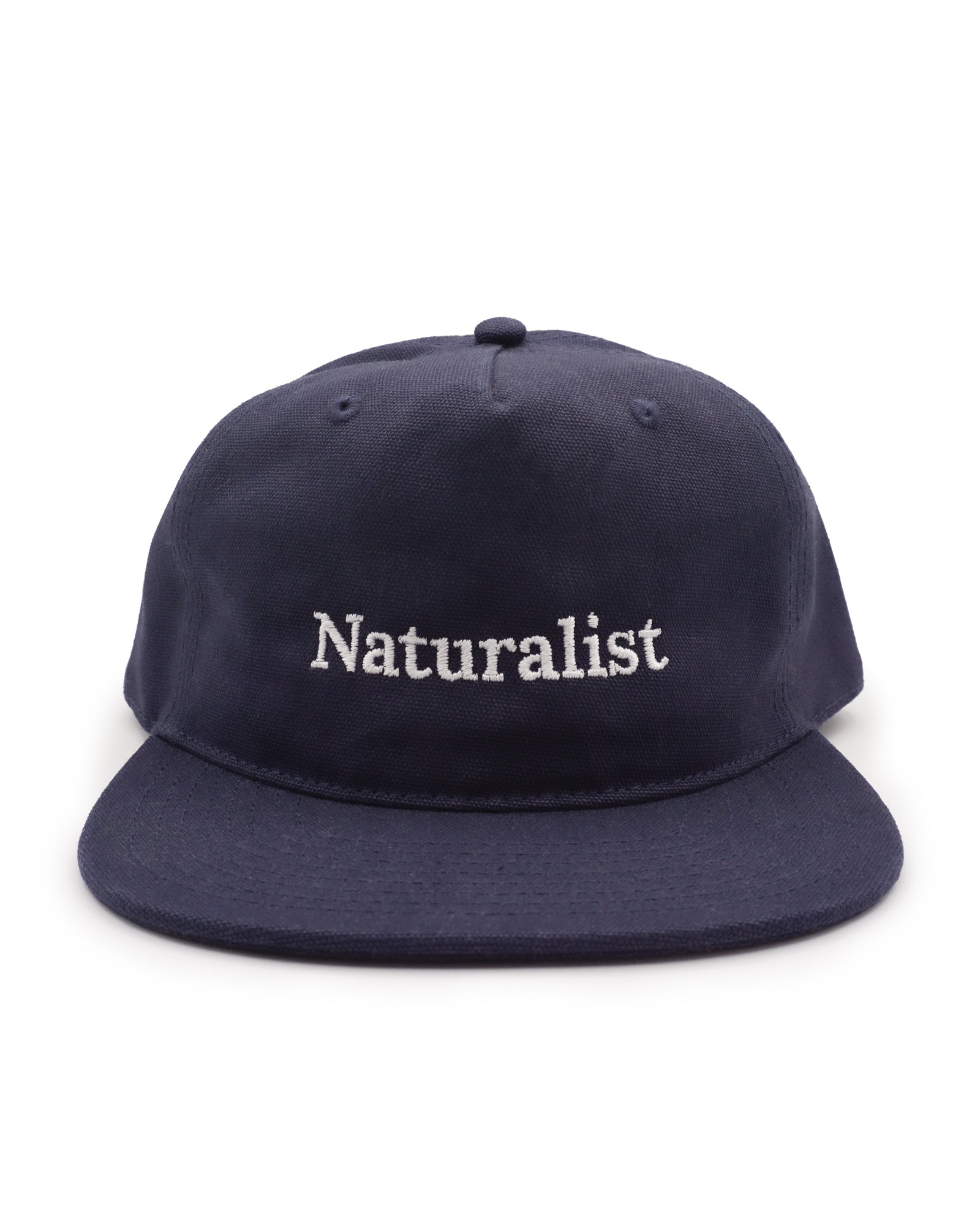 Navy blue cap with 'Naturalist' text on a white background