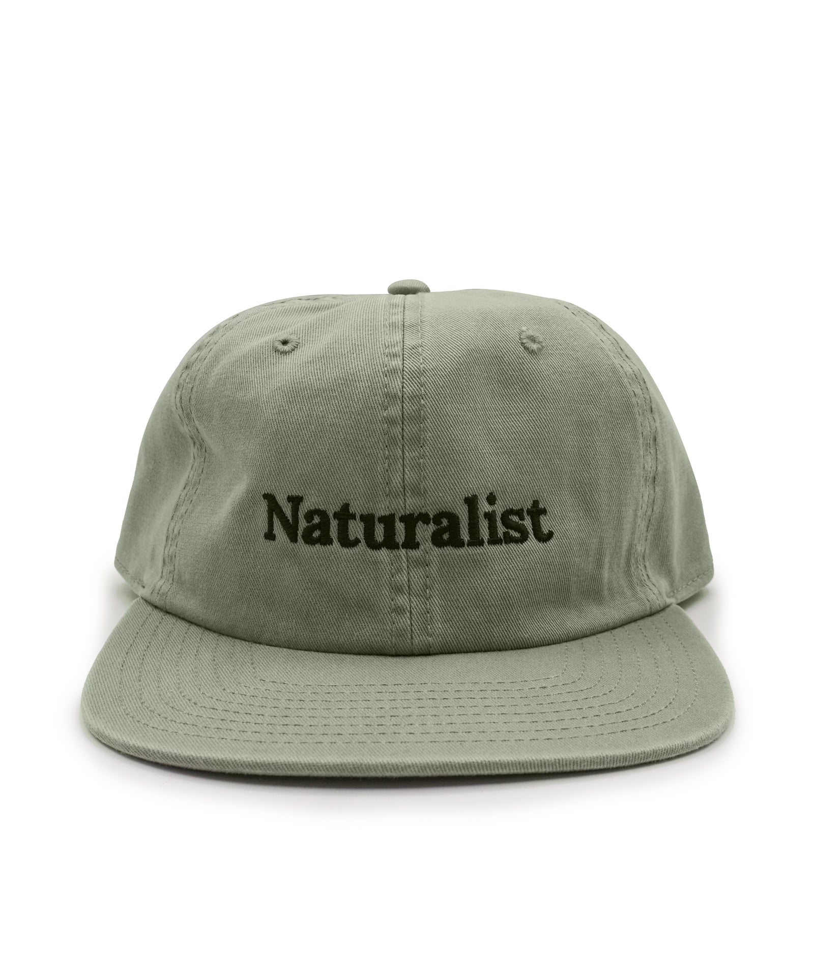 Leaf green cap with 'Naturalist' text on a white background