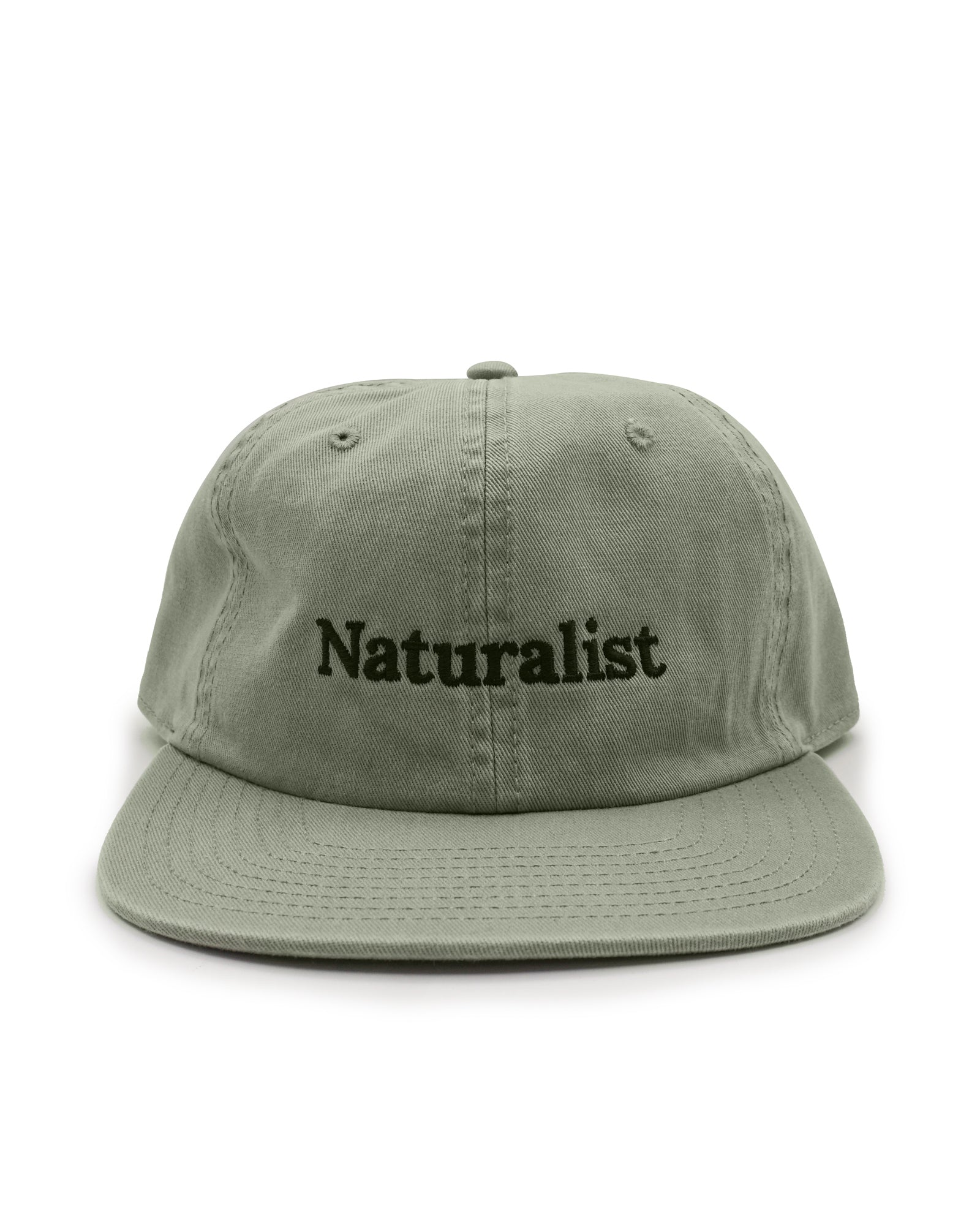 Leaf green cap with 'Naturalist' text on a white background