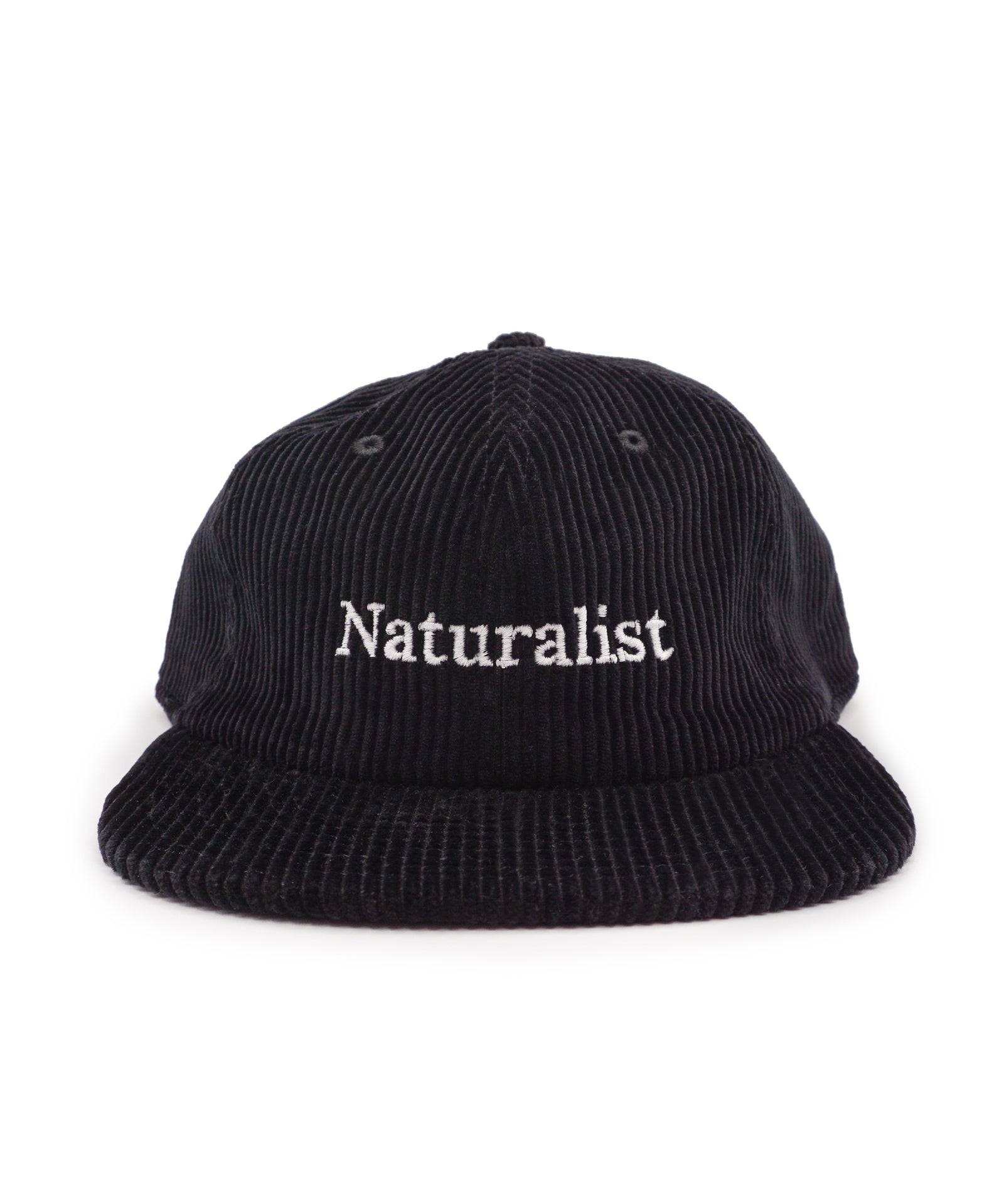Black corduroy cap with 'Naturalist' text on a white background