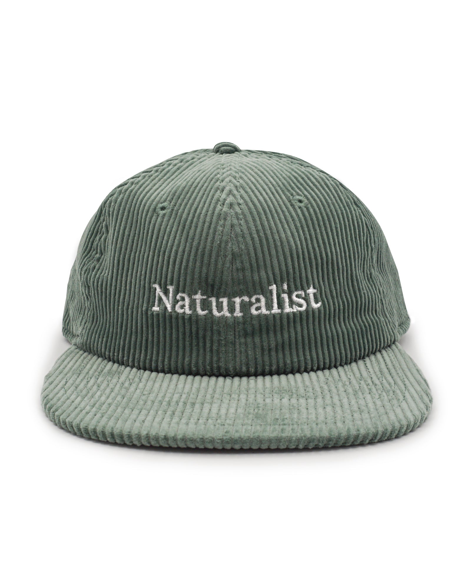 Green corduroy cap with 'Naturalist' text on a white background