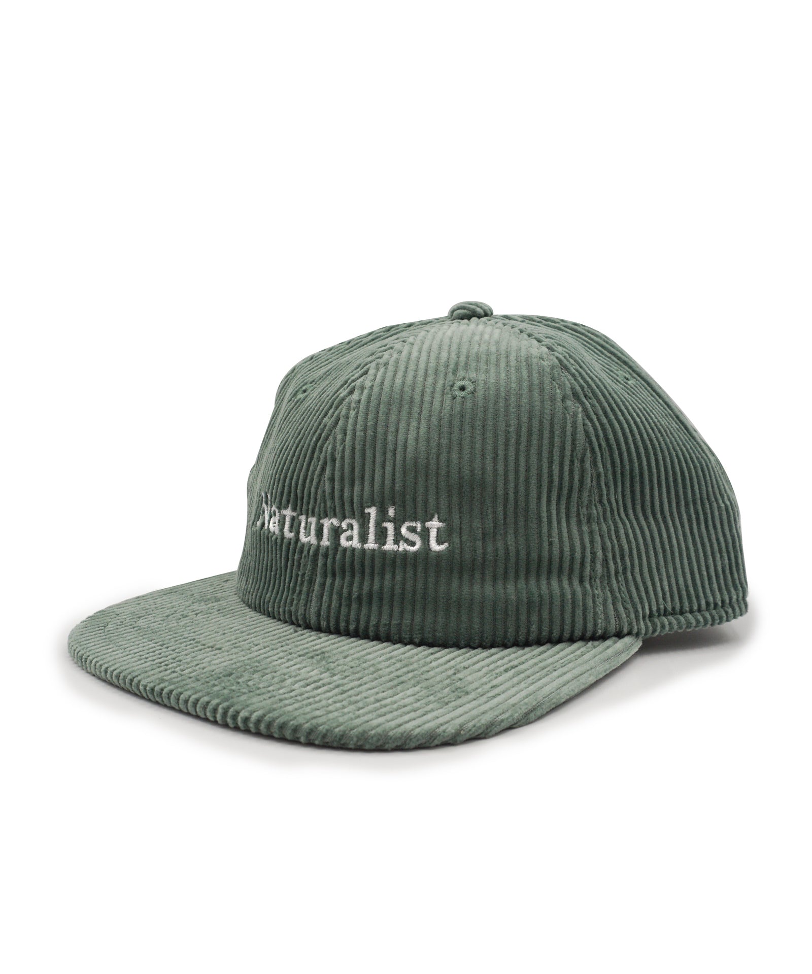 Green corduroy cap with 'naturalist' embroidery on a white background