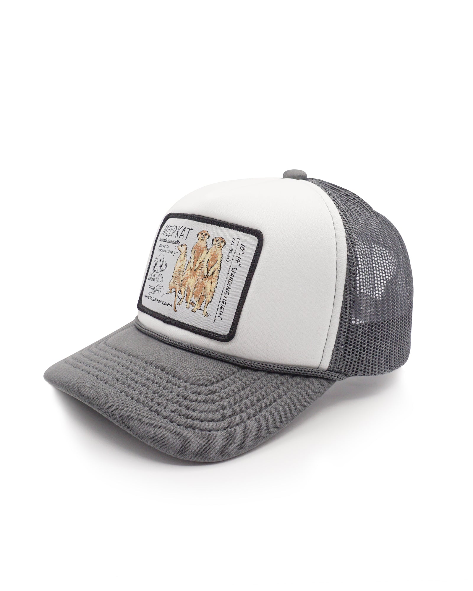 Gray and white youth trucker hat with a meerkat patch on a white background
