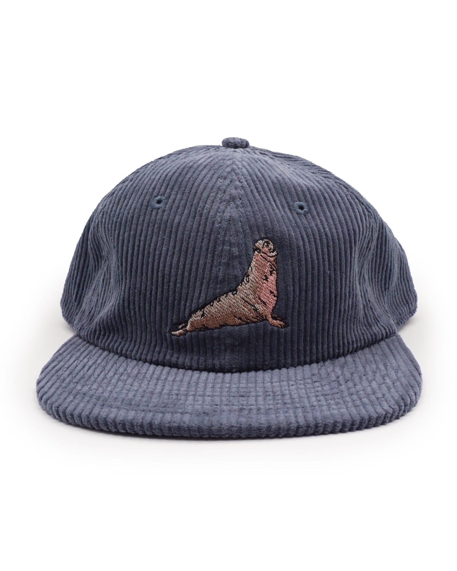 Blue corduroy cap with an embroidered elephant seal design on a white background
