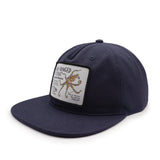 Navy blue cap with a patch featuring an octopus design on a white background