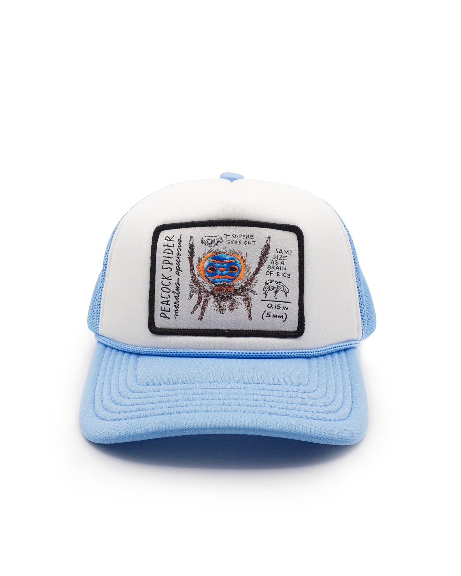 Light blue and white youth trucker hat with peacock spider design patch on a white background