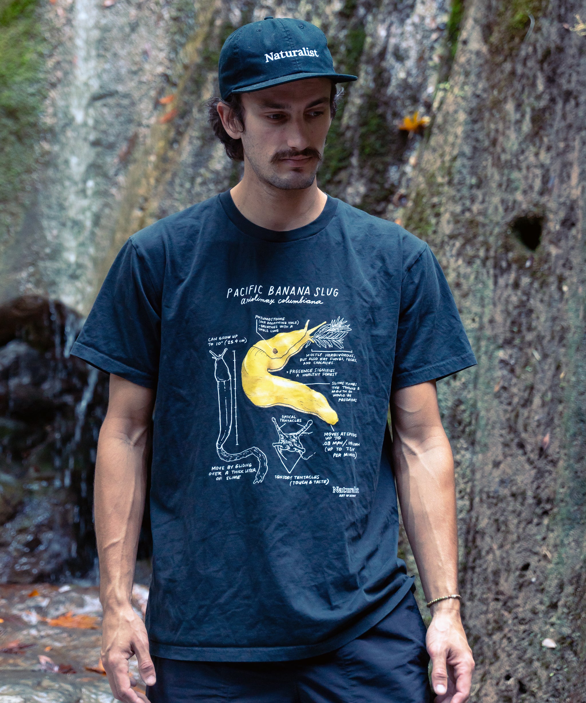 man wearing a banana slug shirt 