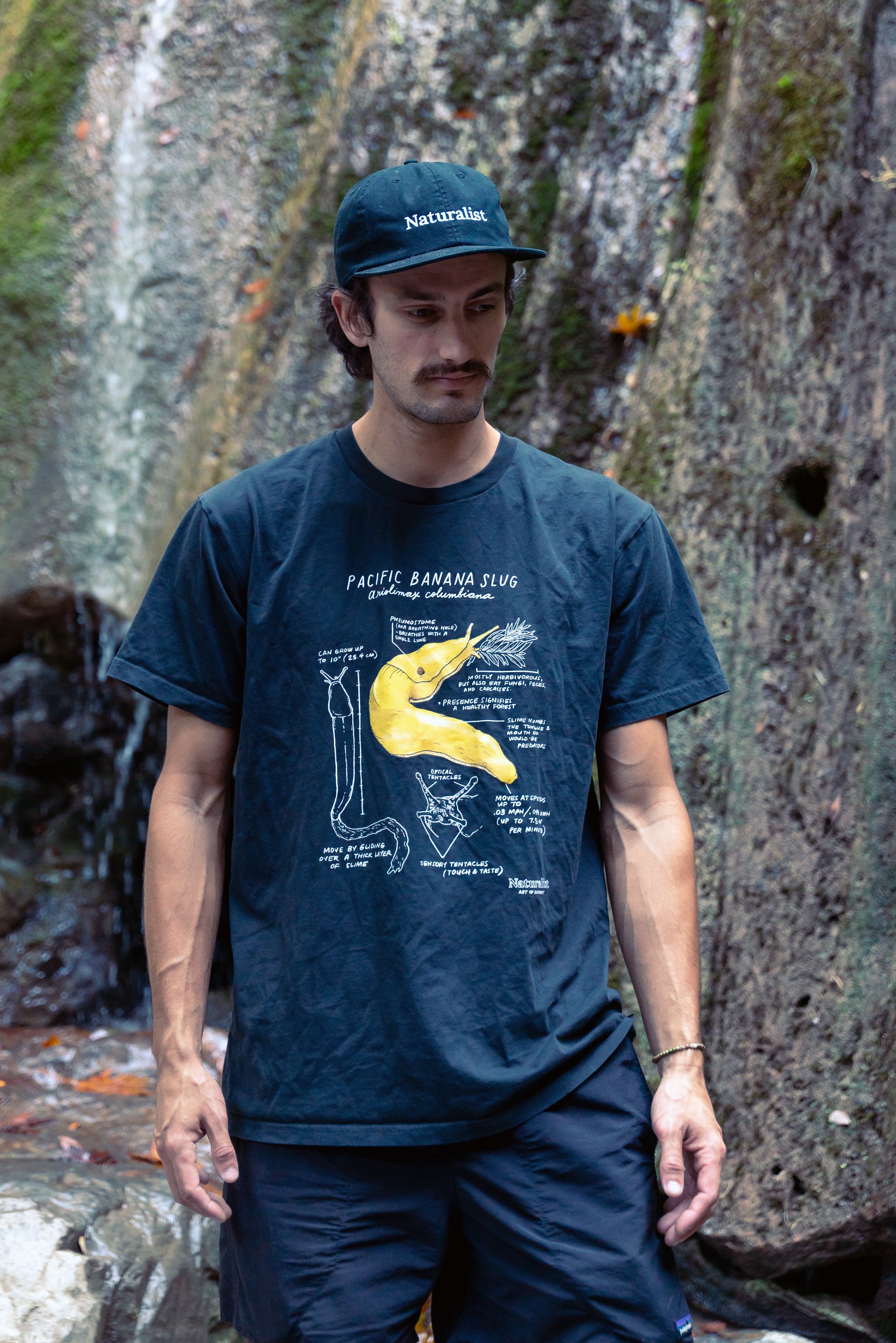 man wearing a banana slug shirt 