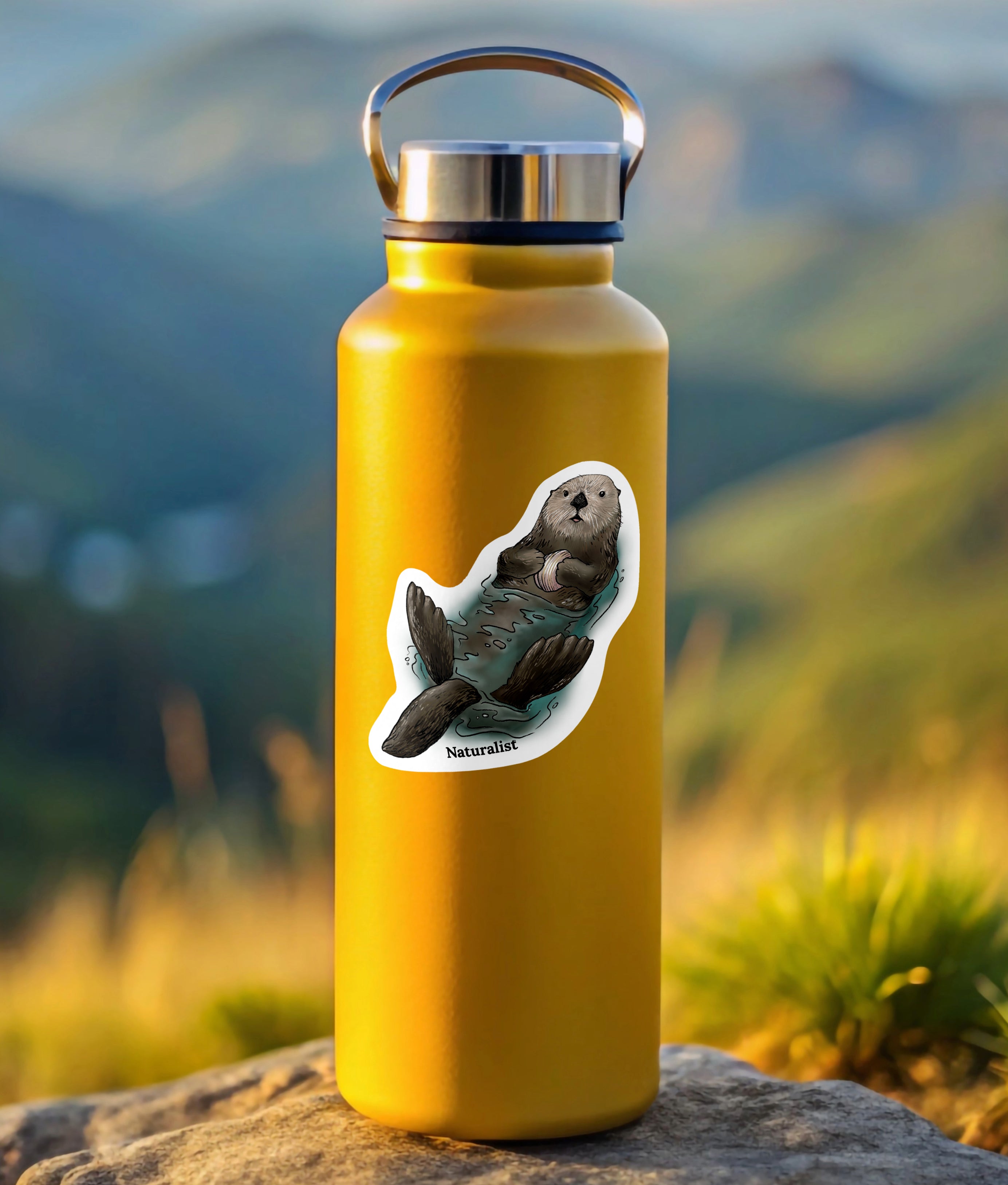 Yellow water bottle with a sticker of a sea otter