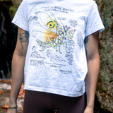 Person wearing a white t-shirt with a detailed illustration of a spiny mantis 